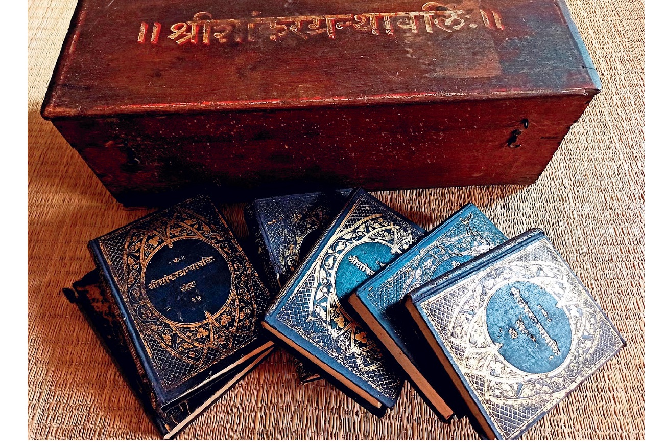The wooden box lettered Sri Shankara Granthavali, with bound volumes of the edition